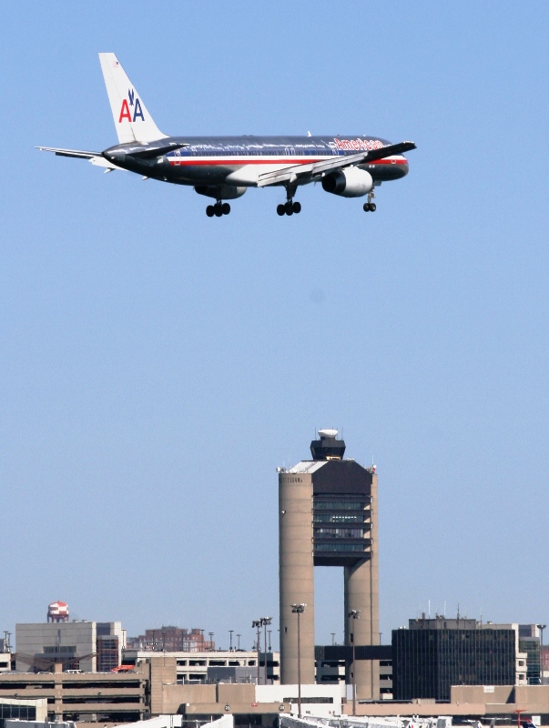 American 757-223 over Logan Tower