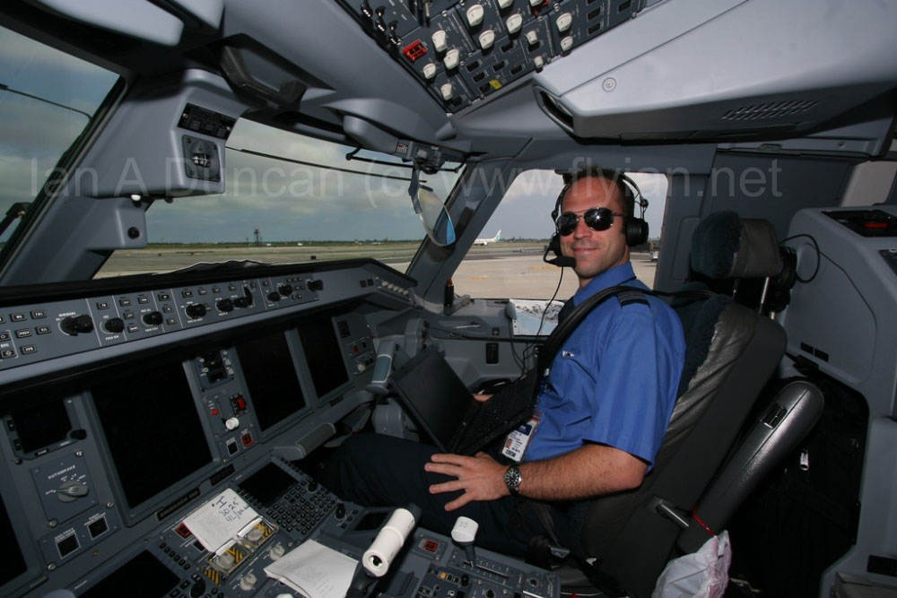 Thomas in 190 cockpit at JFK