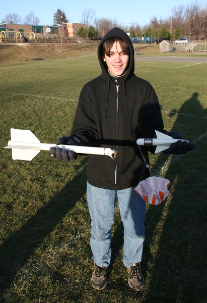 Sean holding sidwinder after impact