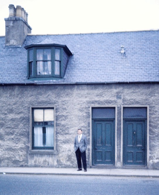 Dad and building where dad was born