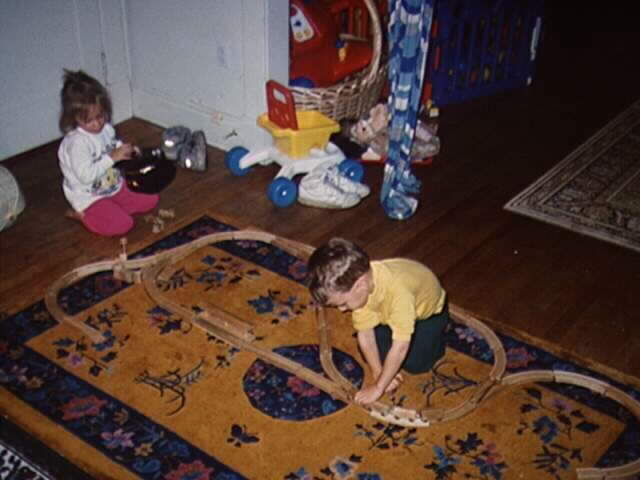 Jay & Amanda play with wooden trains