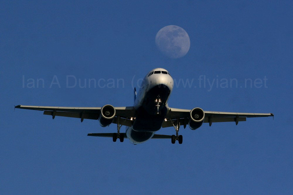 JetBlue Airbus A-320 and rising moon