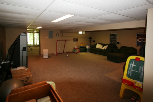 Finished basement looking towards next room